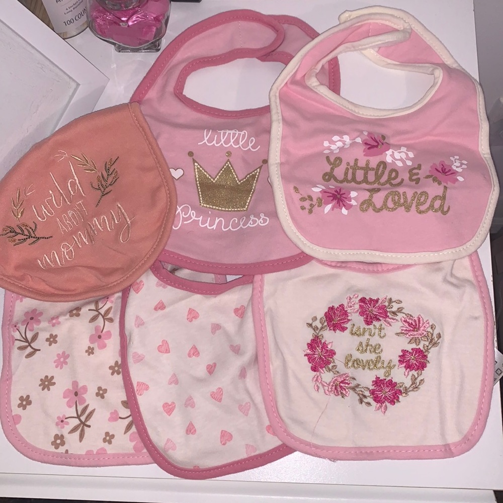 Baby girl bibs, brand new never used.